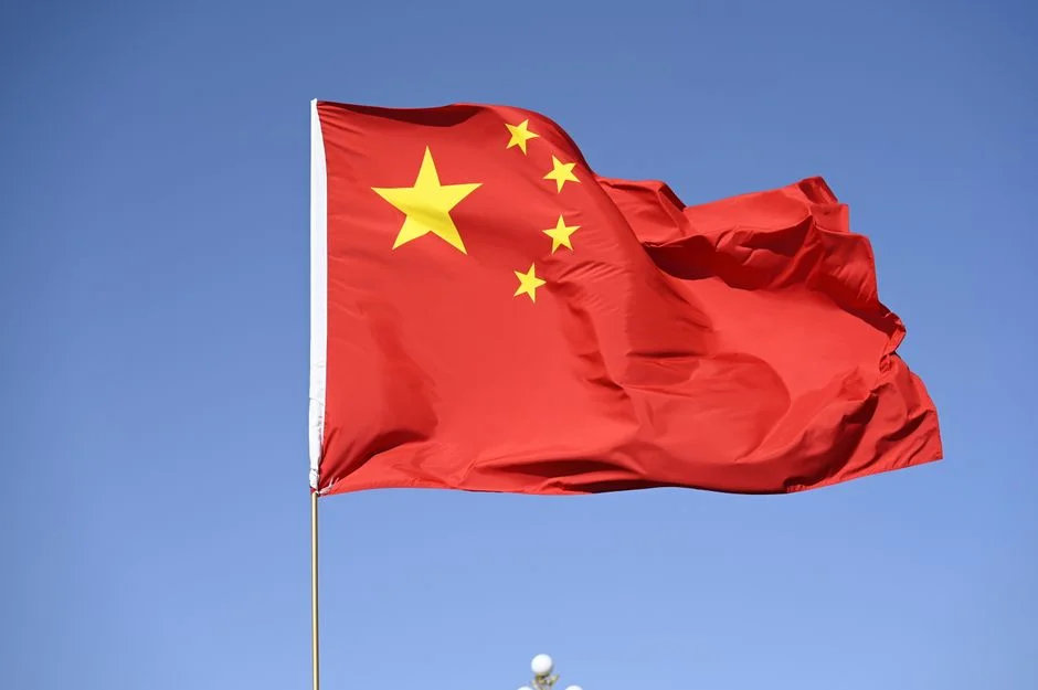 China Faces Investor Pressure After Dissident's Dramatic Escape to Canada — Artificial Intelligence